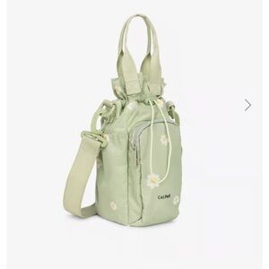 Calpak water bottle holder in Daisy